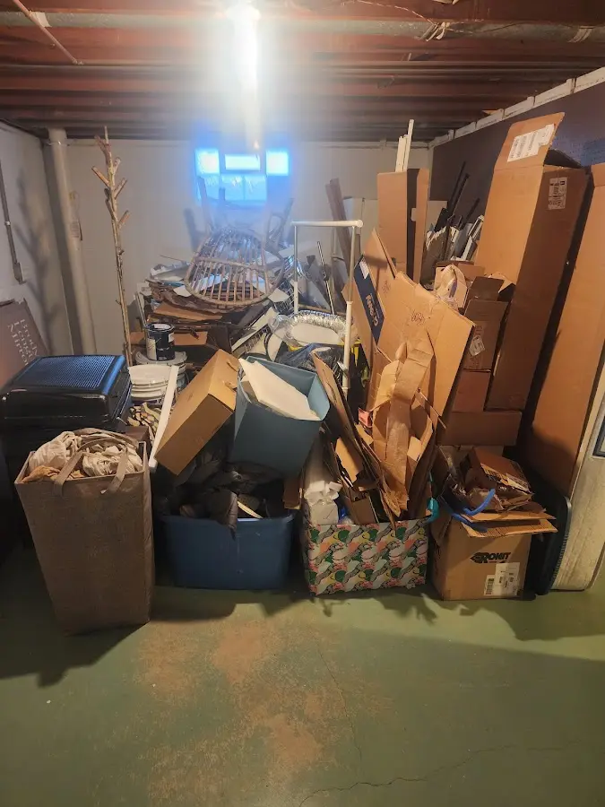 Roll-off dumpster container at job site for 6 Yard Dumpster Rental in Cambridge